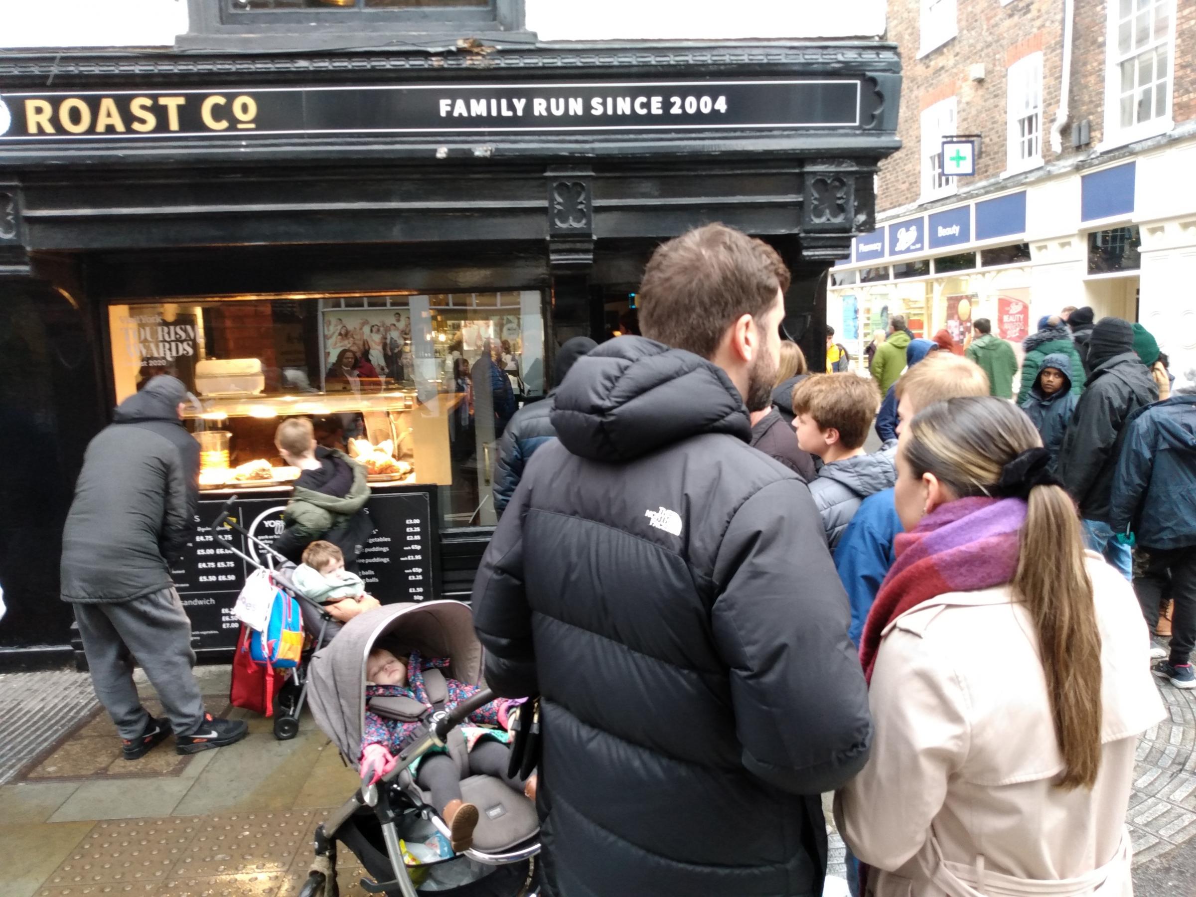 The queue for Hog Roast. Pic by Mike Laycock. 